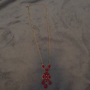 Gold necklace with red stones